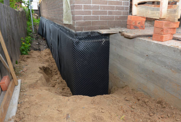 Happy homeowners after waterproofing job in Cedar Knolls